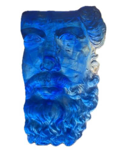 Archaic-style resin sculpture in blue with light diffusion.