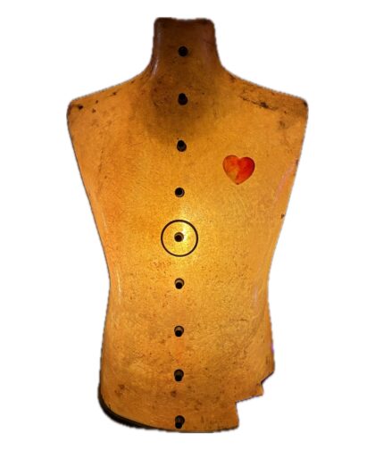 Transparent torso with lighting and resin nails.