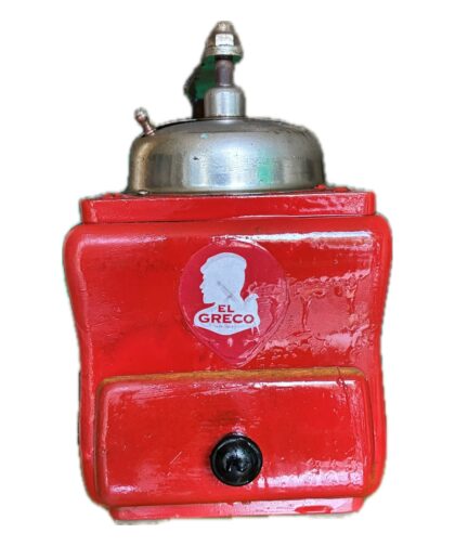 Vintage table-top coffee grinder with lighting.