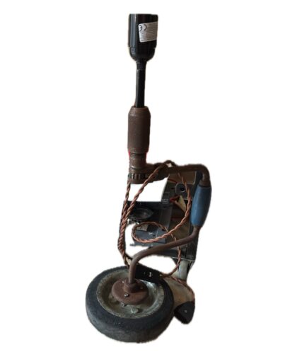 Vintage Tripani with lighting and fabric-covered cord.